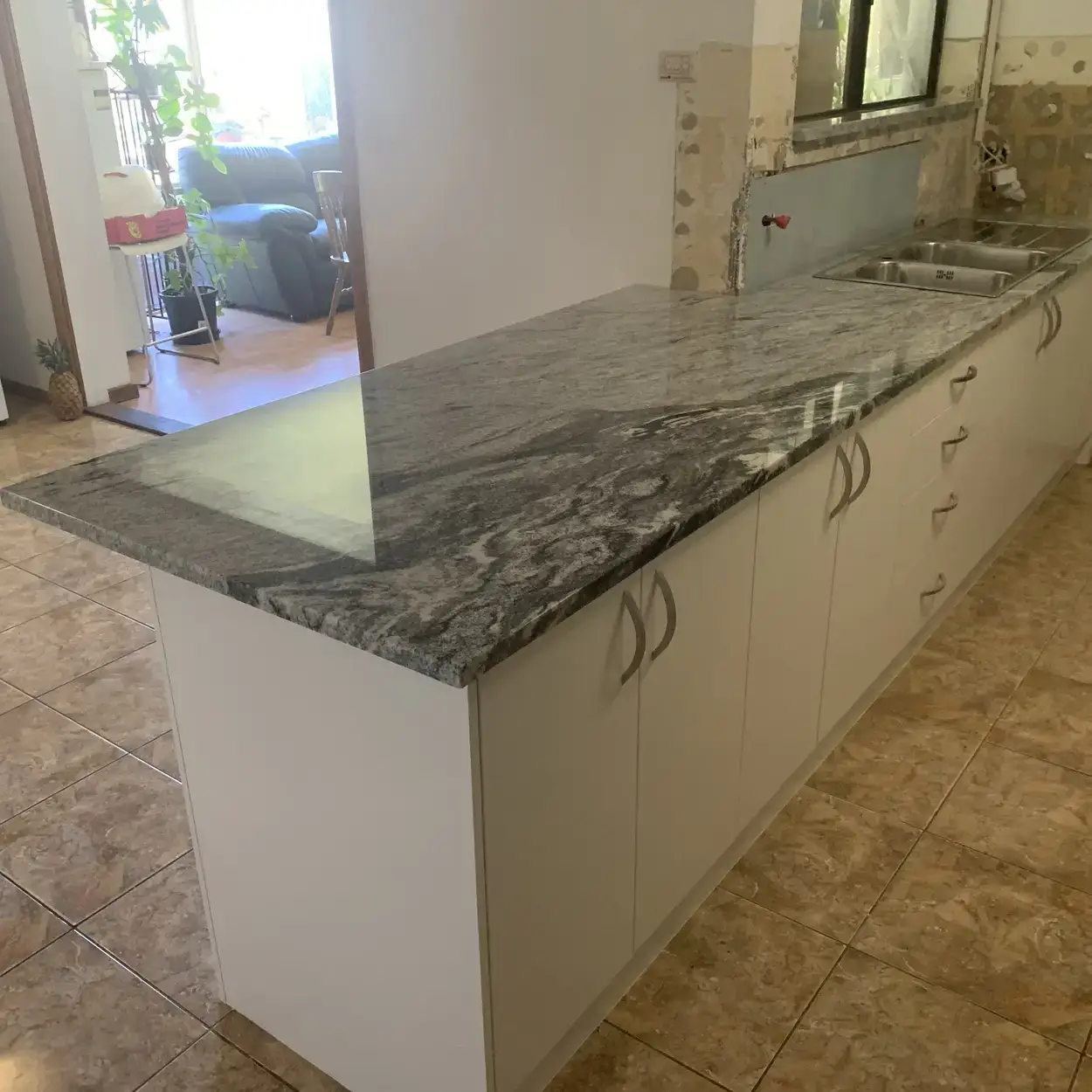 Image of a kitchen or bathroom with granite, marble or engineered stone. For demonstration purposes only.