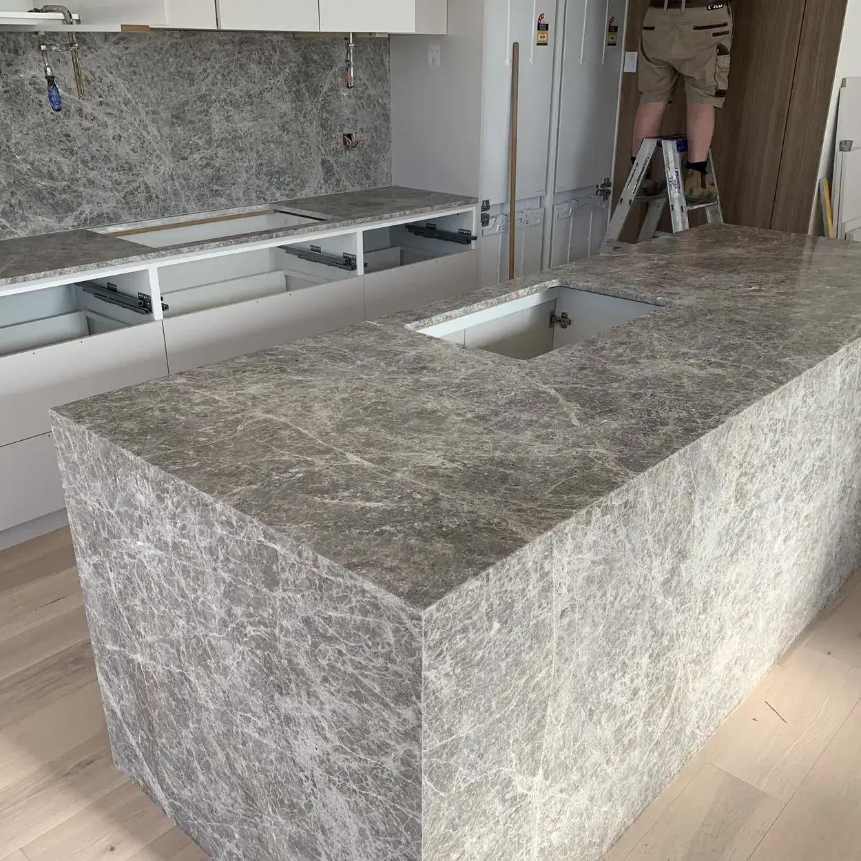 Image of a kitchen or bathroom with granite, marble or engineered stone. For demonstration purposes only.