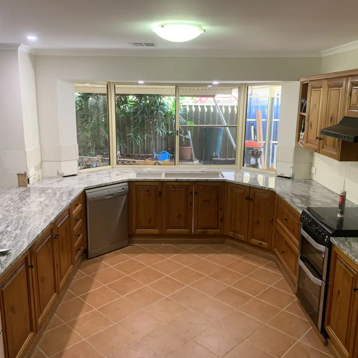 Image of a kitchen or bathroom with granite, marble or engineered stone. For demonstration purposes only.