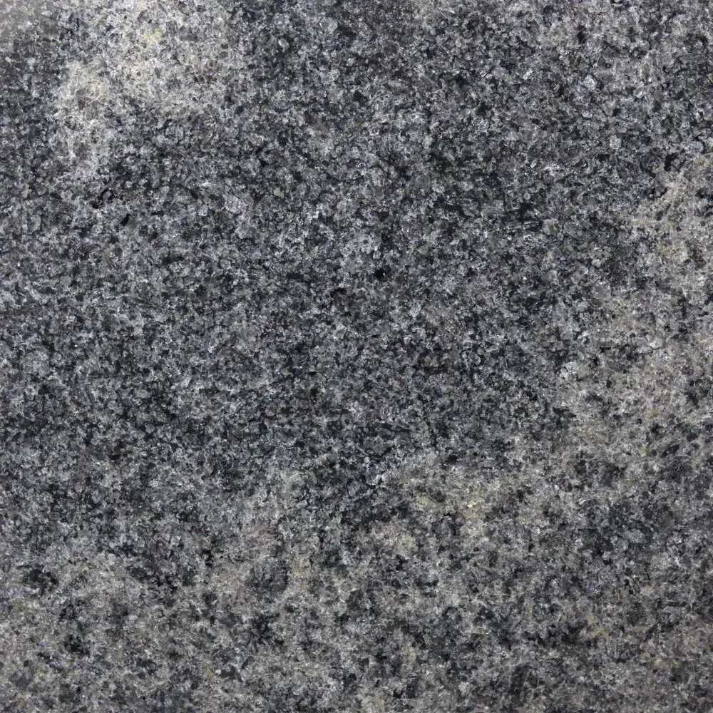 A colour way of Granite called Black Melange, it is supplied by Complete Marble and Granite for SA Marble & Stone.